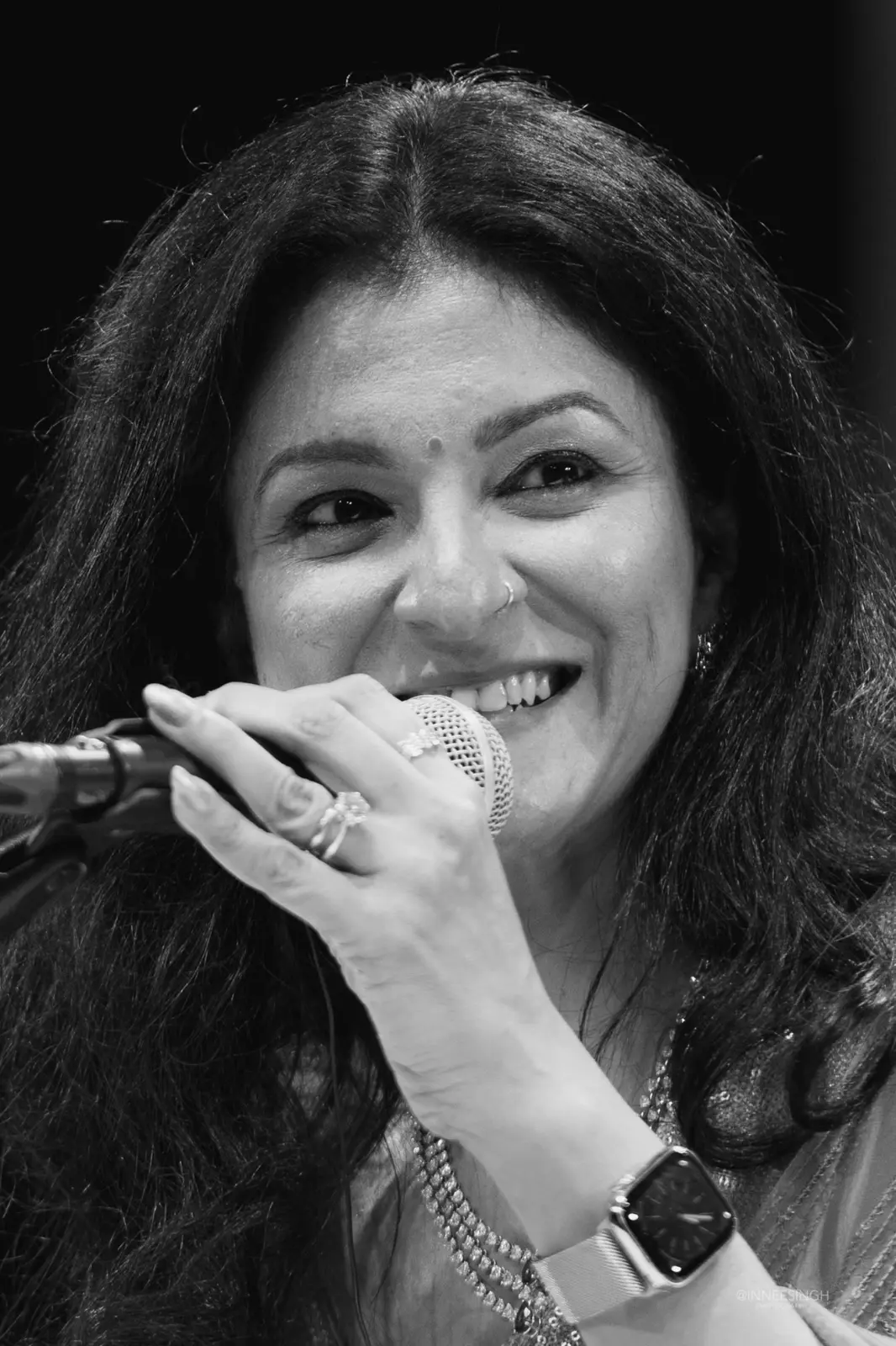 Meghnaa smiling